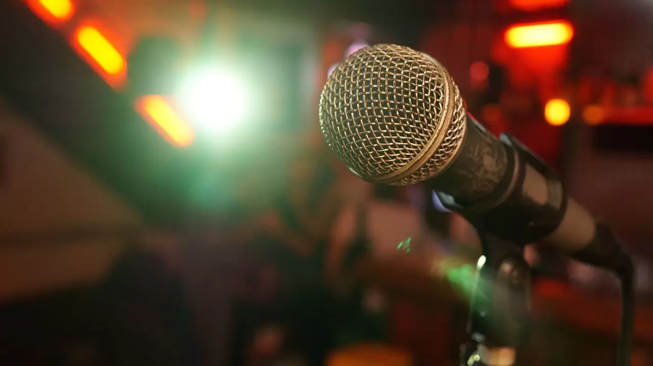 Microphone on stage used for stand up comedy.